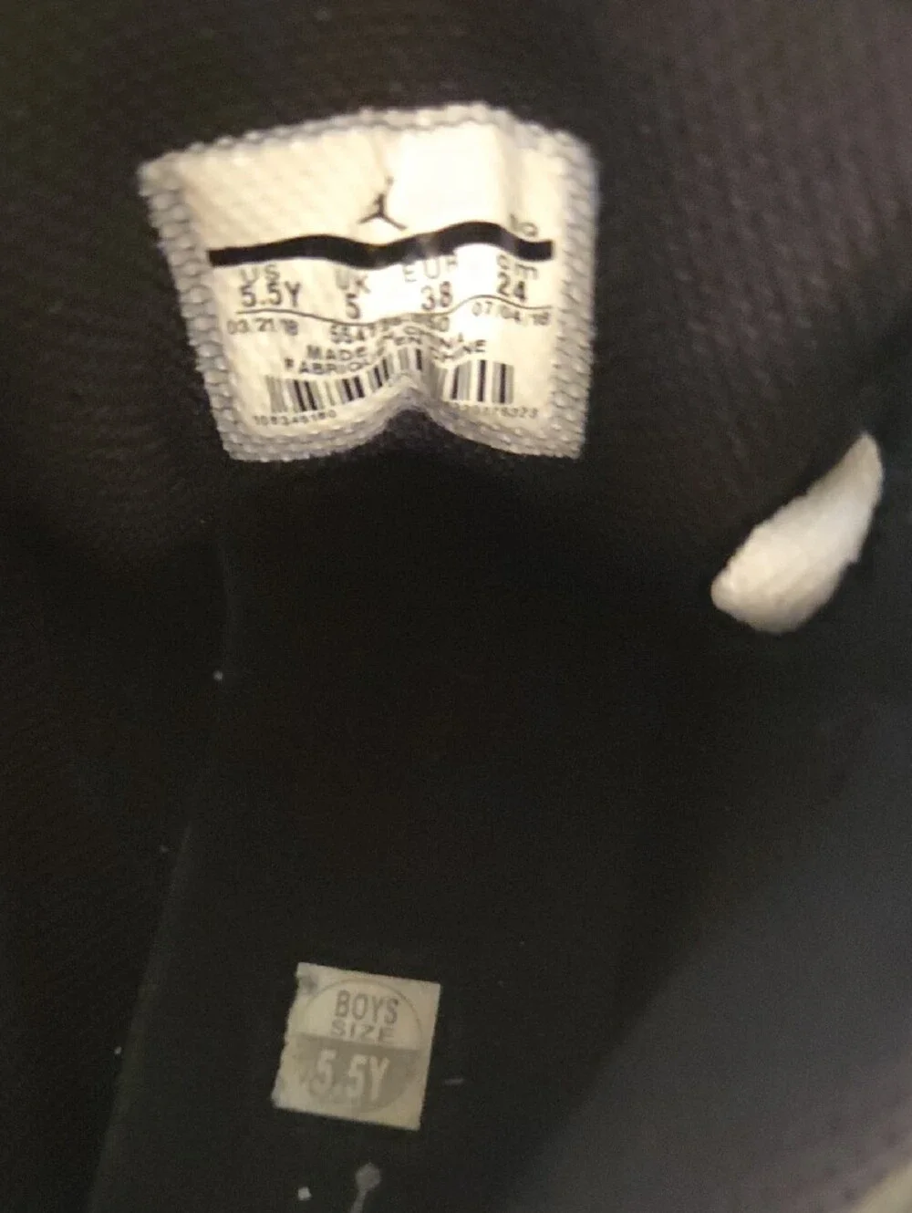Jordan Kids Black and White High-Top Sneakers